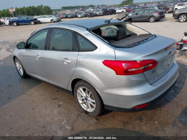 Photo 2 VIN: 1FADP3F23GL330673 - FORD FOCUS 