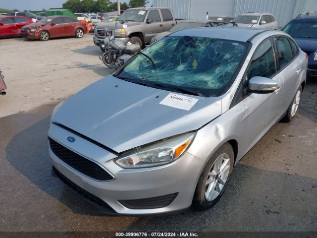 Photo 5 VIN: 1FADP3F23GL330673 - FORD FOCUS 