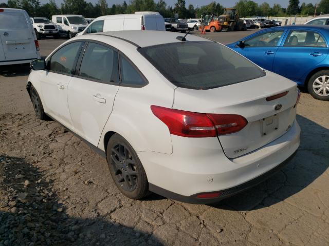 Photo 2 VIN: 1FADP3F23GL331936 - FORD FOCUS SE 