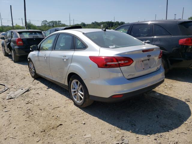 Photo 2 VIN: 1FADP3F23GL338823 - FORD FOCUS SE 