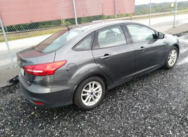 Photo 3 VIN: 1FADP3F23GL341107 - FORD FOCUS 