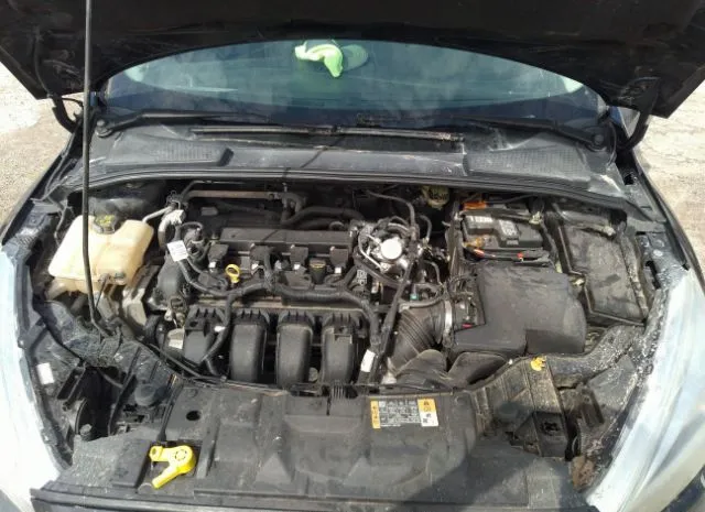 Photo 9 VIN: 1FADP3F23GL360207 - FORD FOCUS 