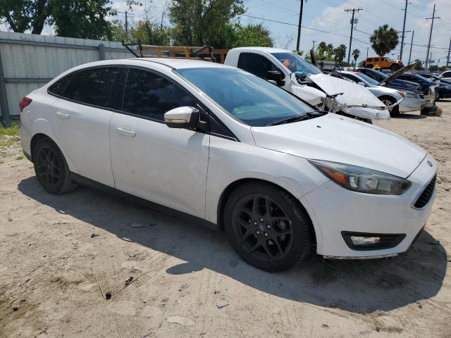 Photo 3 VIN: 1FADP3F23GL370154 - FORD FOCUS SE 