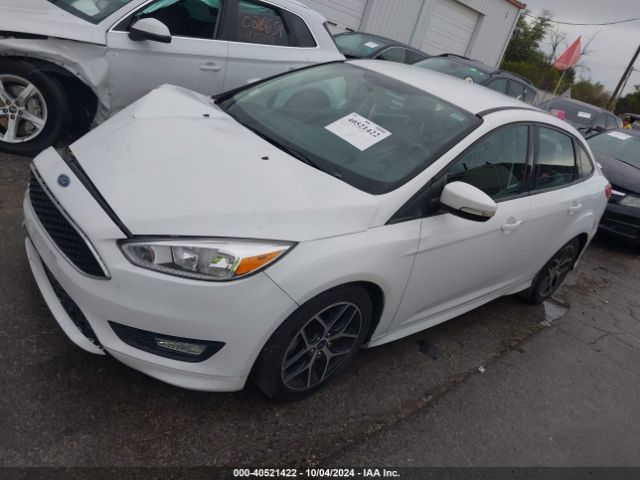 Photo 1 VIN: 1FADP3F23GL371711 - FORD FOCUS 