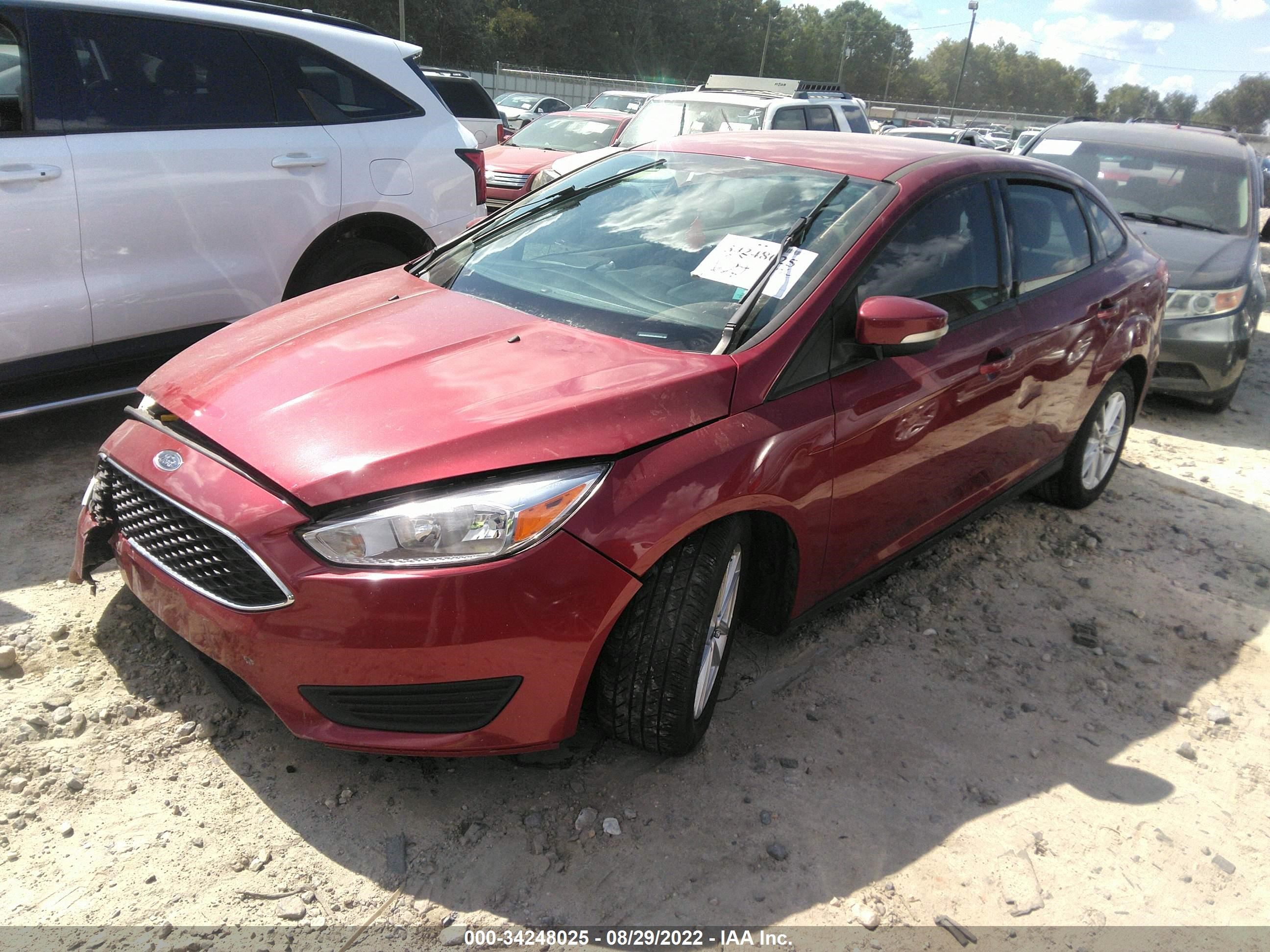 Photo 1 VIN: 1FADP3F23GL385849 - FORD FOCUS 