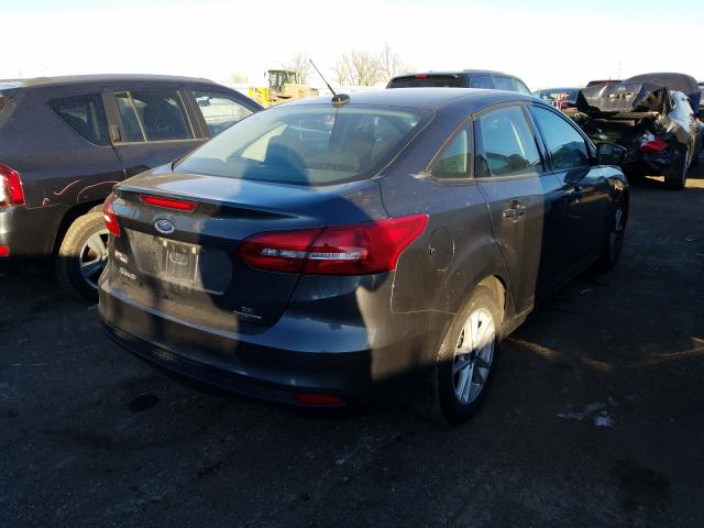 Photo 3 VIN: 1FADP3F23GL386256 - FORD FOCUS 