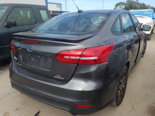 Photo 3 VIN: 1FADP3F23GL389402 - FORD FOCUS SE 