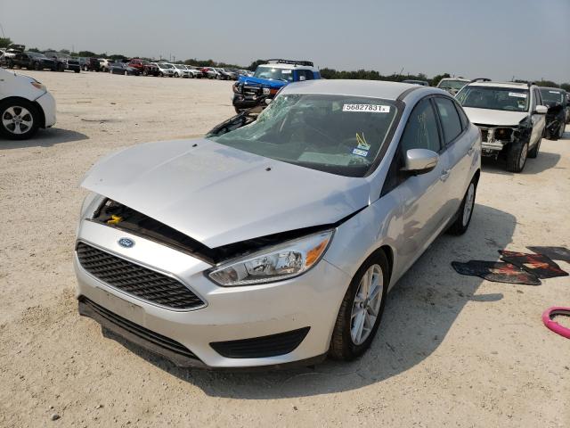 Photo 1 VIN: 1FADP3F23GL391117 - FORD FOCUS SE 