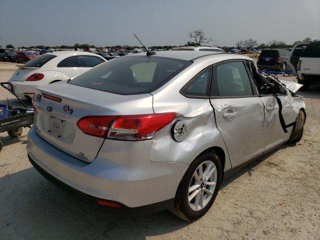 Photo 3 VIN: 1FADP3F23GL391117 - FORD FOCUS SE 