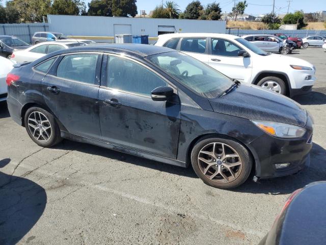 Photo 3 VIN: 1FADP3F23GL396074 - FORD FOCUS SE 