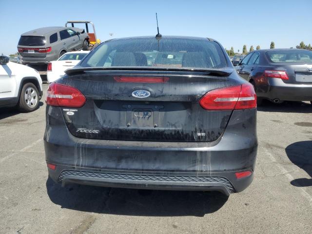 Photo 5 VIN: 1FADP3F23GL396074 - FORD FOCUS SE 