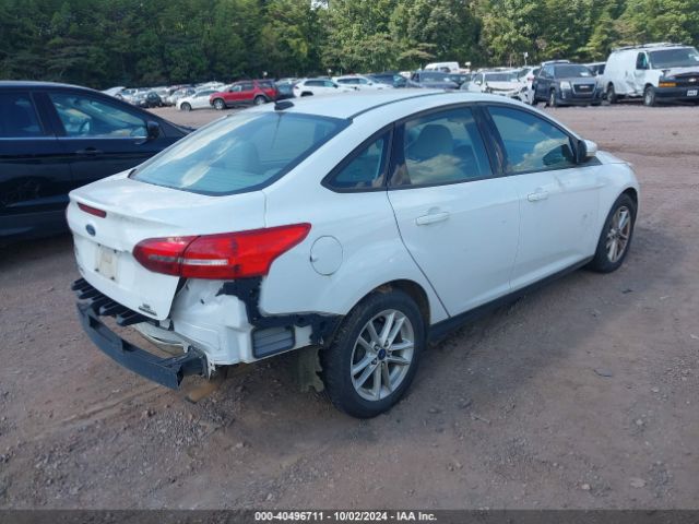 Photo 3 VIN: 1FADP3F23GL396933 - FORD FOCUS 