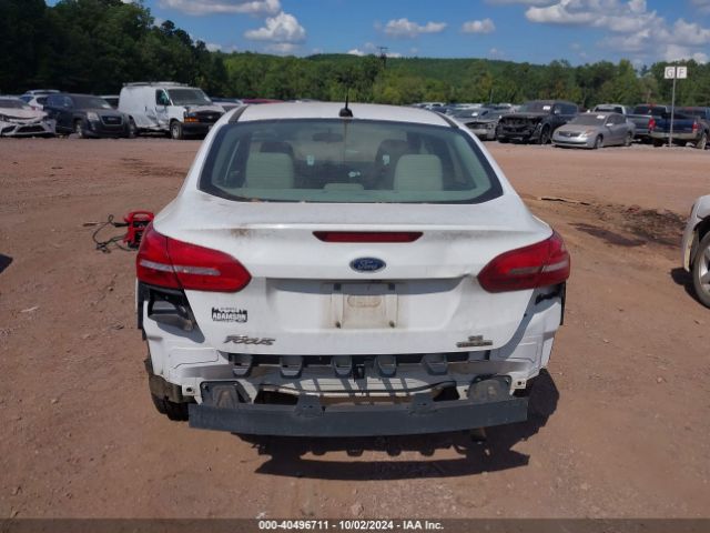 Photo 5 VIN: 1FADP3F23GL396933 - FORD FOCUS 