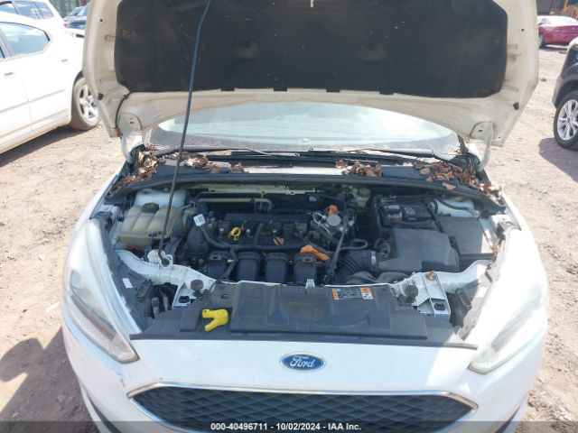 Photo 9 VIN: 1FADP3F23GL396933 - FORD FOCUS 