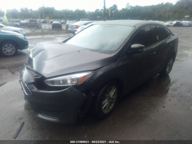 Photo 1 VIN: 1FADP3F23GL397449 - FORD FOCUS 