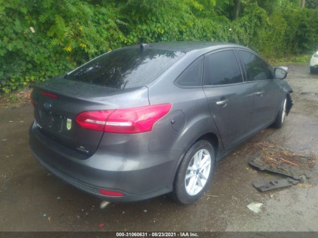 Photo 3 VIN: 1FADP3F23GL397449 - FORD FOCUS 