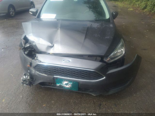 Photo 5 VIN: 1FADP3F23GL397449 - FORD FOCUS 