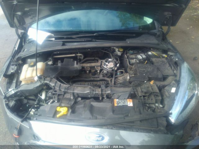 Photo 9 VIN: 1FADP3F23GL397449 - FORD FOCUS 