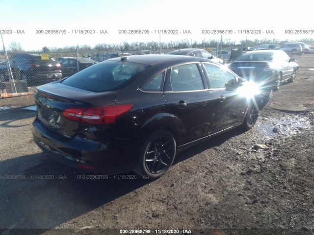 Photo 3 VIN: 1FADP3F23GL397953 - FORD FOCUS 