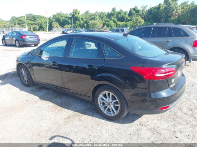 Photo 2 VIN: 1FADP3F23GL401113 - FORD FOCUS 