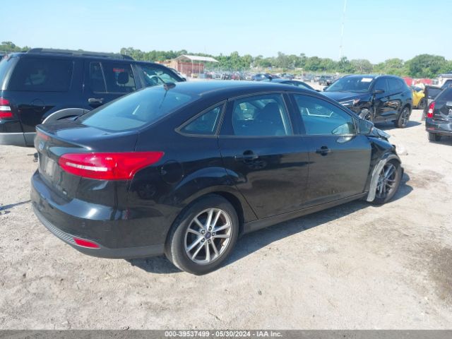 Photo 3 VIN: 1FADP3F23GL401113 - FORD FOCUS 