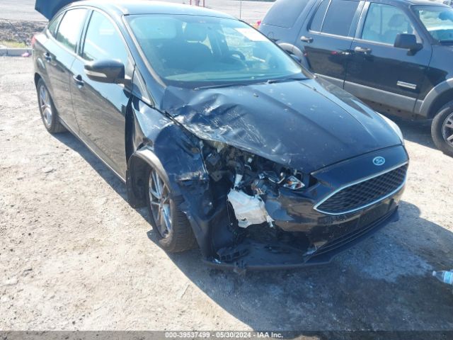 Photo 5 VIN: 1FADP3F23GL401113 - FORD FOCUS 