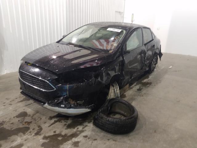 Photo 1 VIN: 1FADP3F23GL405131 - FORD FOCUS SE 