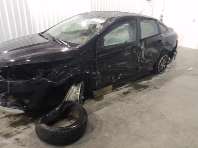 Photo 8 VIN: 1FADP3F23GL405131 - FORD FOCUS SE 