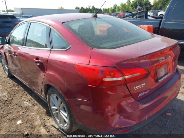 Photo 2 VIN: 1FADP3F23GL406294 - FORD FOCUS 