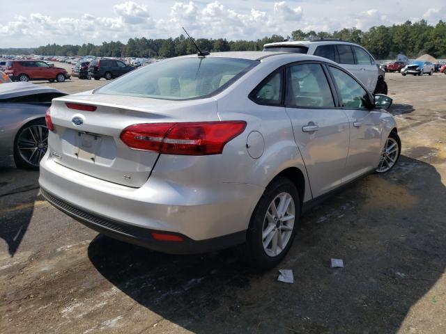 Photo 3 VIN: 1FADP3F23HL208476 - FORD FOCUS SE 