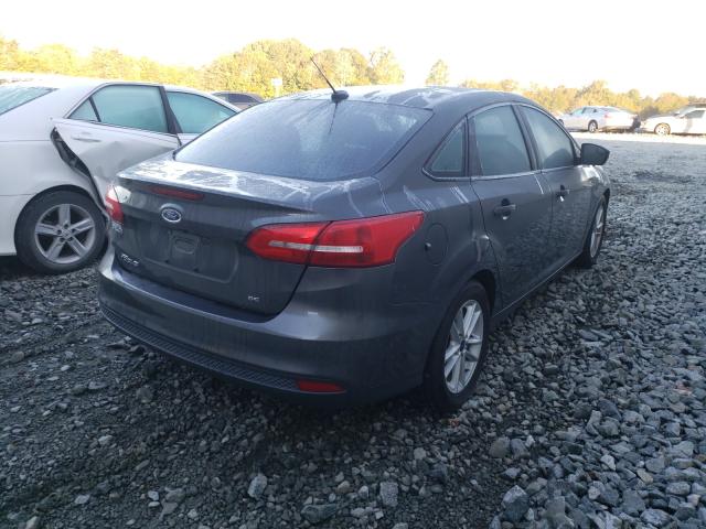 Photo 3 VIN: 1FADP3F23HL269584 - FORD FOCUS SE 