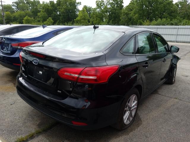 Photo 3 VIN: 1FADP3F23HL285543 - FORD FOCUS 