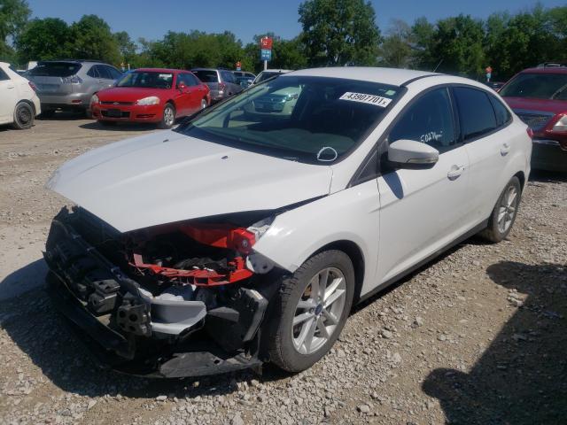 Photo 1 VIN: 1FADP3F23HL299457 - FORD FOCUS SE 