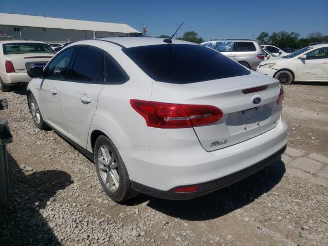 Photo 2 VIN: 1FADP3F23HL299457 - FORD FOCUS SE 