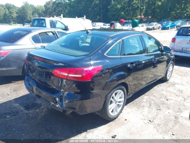 Photo 3 VIN: 1FADP3F23JL215238 - FORD FOCUS 