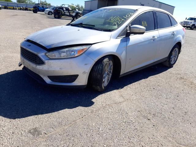 Photo 1 VIN: 1FADP3F23JL224103 - FORD FOCUS SE 