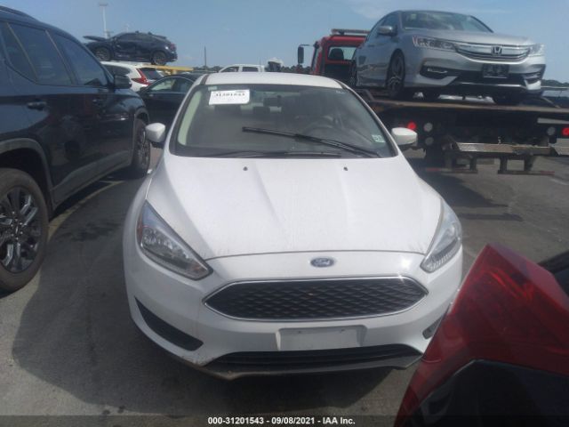 Photo 5 VIN: 1FADP3F23JL254556 - FORD FOCUS 