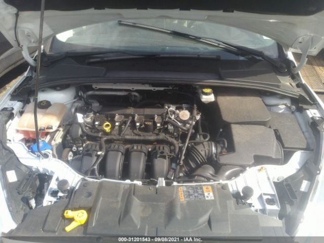 Photo 9 VIN: 1FADP3F23JL254556 - FORD FOCUS 