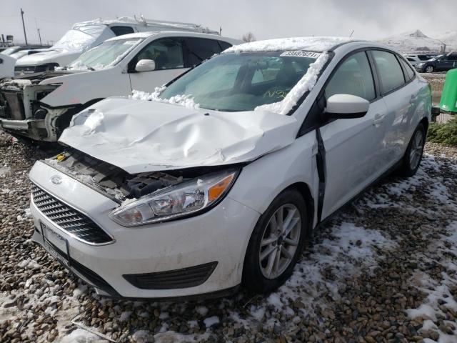 Photo 1 VIN: 1FADP3F23JL262317 - FORD FOCUS SE 