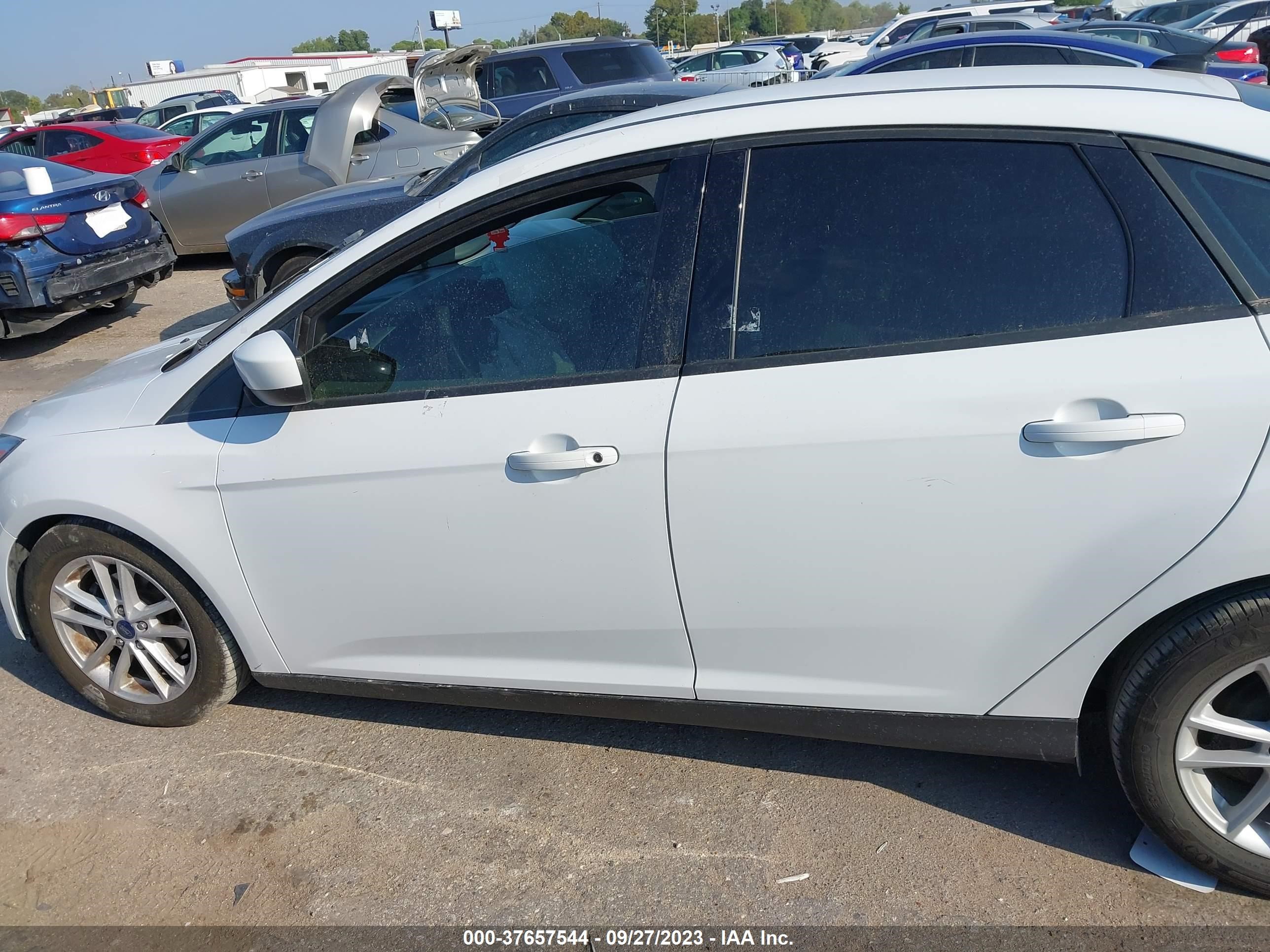 Photo 13 VIN: 1FADP3F23JL275259 - FORD FOCUS 