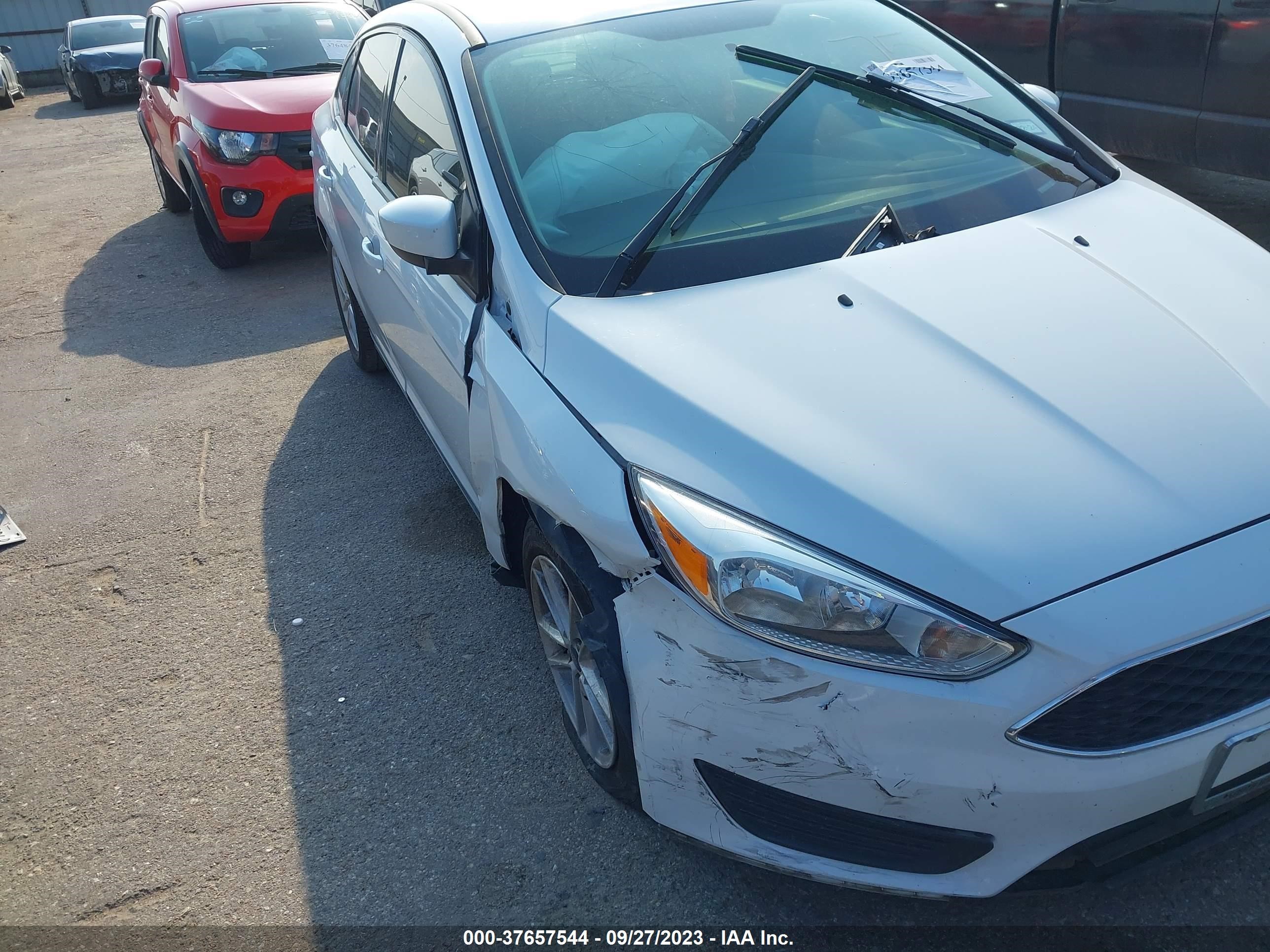 Photo 5 VIN: 1FADP3F23JL275259 - FORD FOCUS 