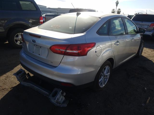 Photo 3 VIN: 1FADP3F23JL280249 - FORD FOCUS 