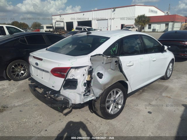 Photo 3 VIN: 1FADP3F23JL291073 - FORD FOCUS 