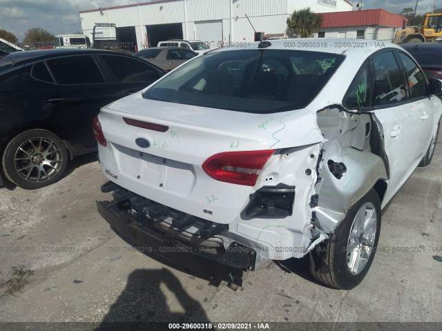 Photo 5 VIN: 1FADP3F23JL291073 - FORD FOCUS 