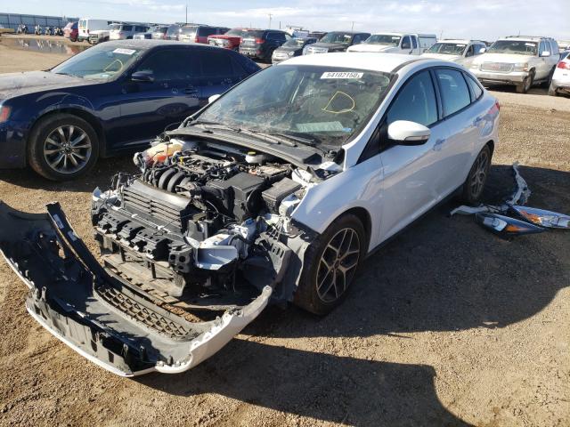 Photo 1 VIN: 1FADP3F23JL292935 - FORD FOCUS SE 