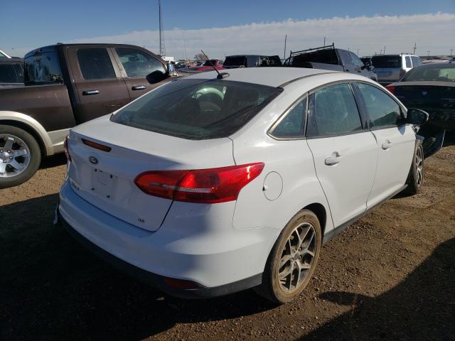 Photo 3 VIN: 1FADP3F23JL292935 - FORD FOCUS SE 