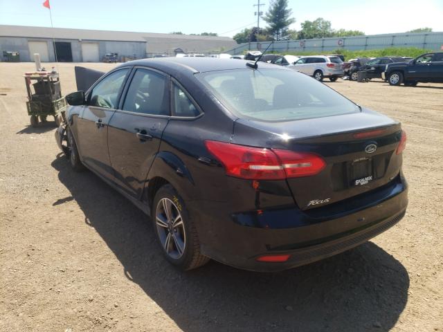 Photo 2 VIN: 1FADP3F23JL302038 - FORD FOCUS SE 