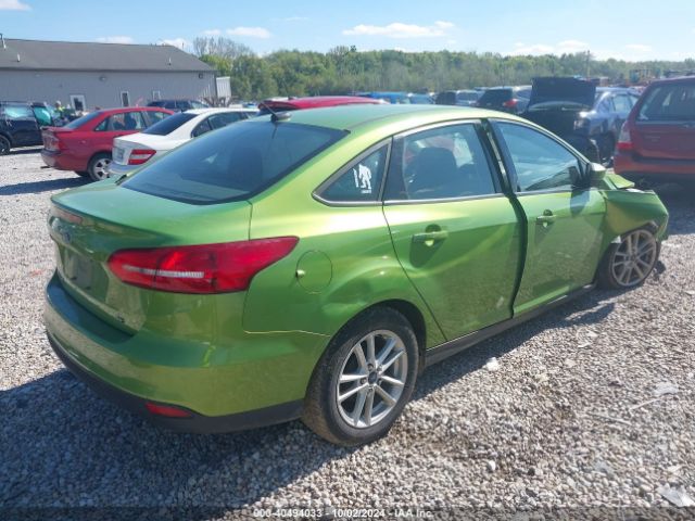 Photo 3 VIN: 1FADP3F23JL310379 - FORD FOCUS 