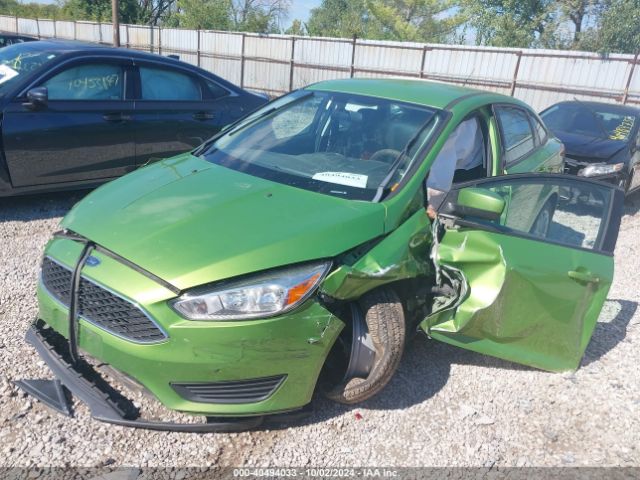 Photo 5 VIN: 1FADP3F23JL310379 - FORD FOCUS 