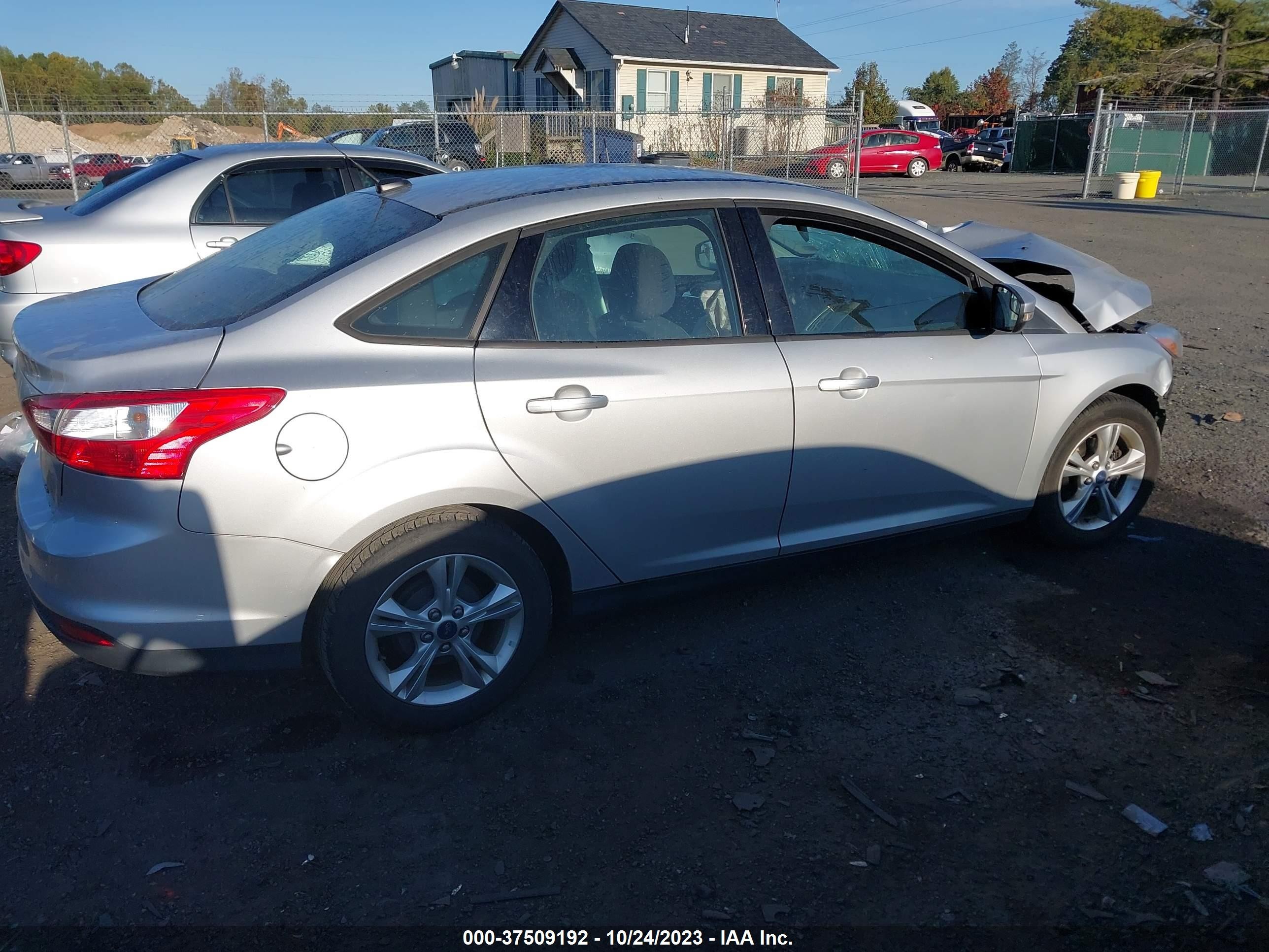 Photo 11 VIN: 1FADP3F24DL149593 - FORD FOCUS 